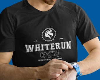 May include: A man wearing a black t-shirt with a white graphic that says "Whiterun Gym" and a white horse head logo. The text below the logo says "Train with the Nordic Ones".