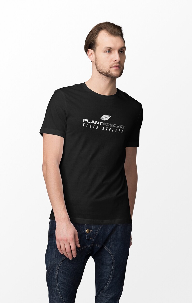 May include: A black t-shirt with a white graphic design that says "PLANT FUEL'D VEGAN ATHLETE" and a stylized leaf image.
