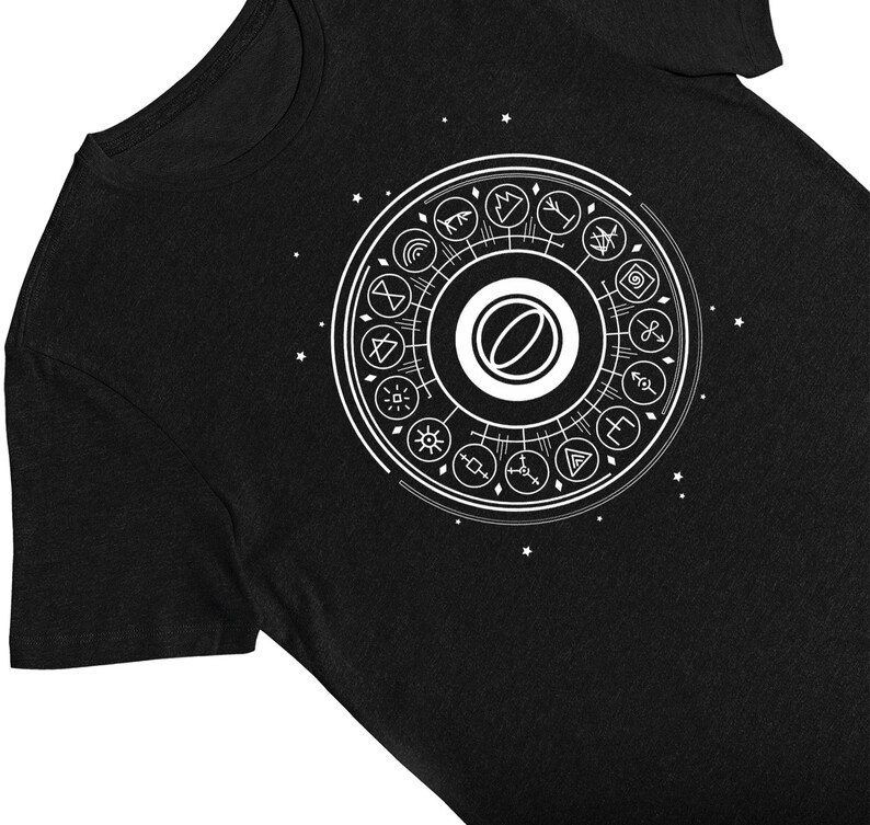 May include: Black t-shirt with a white graphic of a circle with symbols and a central eye.