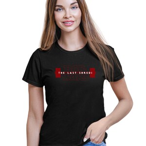 May include: Black t-shirt featuring the red text "BAR WARS THE LAST SHREDI" and a barbell graphic. The shirt has a crew neck design.