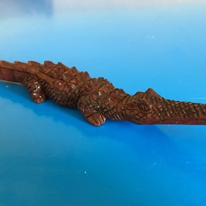 African crocodile  7" or 8" hand carved from Zimbabwe, unique, realistic solid wood you found it!