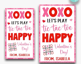 May include: Two printable Valentine's Day cards featuring a tic-tac-toe game board with the text "XOXO Let's Play tic-tac-toe Happy Valentine's Day! From, Isabella" in pink and red. The cards are available in two sizes: 2 inches by 3.5 inches and 2.5 inches by 4 inches.