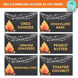 May include: Six printable campfire food labels with a black chalkboard background, white string lights, and a campfire illustration. The labels read: "Oreo Cookies", "Chocolate Bars", "Graham Crackers", "Peanut Butter", "Marshmallows", and "Toasted Coconut".