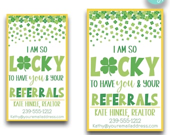 May include: Two printable business cards with a shamrock design and the text "I am so lucky to have you & your referrals". The cards are in green, yellow, and white. The text "Kate Hinkle, Realtor" and contact information is included on the cards. The cards are available in two sizes: 2" x 3.5" and 2.5" x 4".
