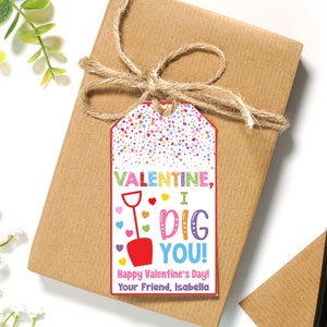 May include: A colorful Valentine's Day gift tag with a shovel and the text "Valentine, I Dig You! Happy Valentine's Day! Your Friend, Isabella."