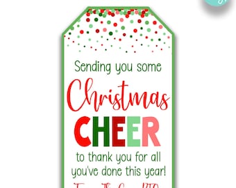 May include: A green and white gift tag with red polka dots. The tag says "Sending you some Christmas CHEER to thank you for all you've done this year! From. The Cape PTO".