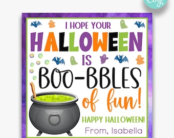May include: A purple and green watercolor background with a cauldron filled with green liquid and a wooden spoon. The text reads "I hope your Halloween is boo-bbles of fun! Happy Halloween! From, Isabella."