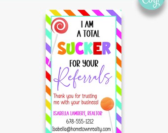 May include: A colorful business card with a lollipop graphic and the text "I am a total sucker for your referrals". The card also includes the name "Isabella Lambert, Realtor" and contact information.