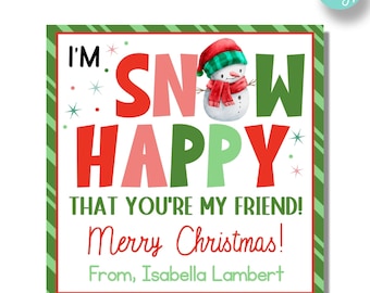 May include: A white card with green and red stripes around the border. The card has a snowman illustration and the text "I'M SNOW HAPPY THAT YOU'RE MY FRIEND! Merry Christmas! From, Isabella Lambert".