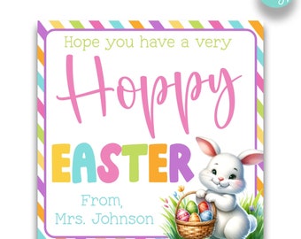 May include: A printable Easter card with a cute bunny holding a basket of eggs. The card has a striped background with the text "Hope you have a very Hoppy Easter" and "From, Mrs. Johnson".