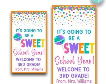 May include: Two printable signs with a colourful confetti background and a lollipop graphic. The text on the signs reads "It's going to be a sweet school year! Welcome to 3rd grade! From, Mrs. Williams". The signs are available in two sizes: 2 inches by 3.5 inches and 2.5 inches by 4.5 inches.