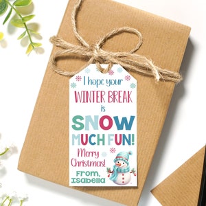 May include: A white gift tag with a snowman illustration and the text "I hope your WINTER BREAK is SNOW MUCH FUN! Merry Christmas! From, Isabella".