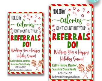 May include: Two printable holiday-themed business cards with a red and white striped border. The text reads "Holiday calories don't count but your referrals do! Wishing you a happy holiday season!" with a candy cane graphic. The business card includes the name Kathy Hinkle, Realtor, Sunshine State Realty, phone number and email address.