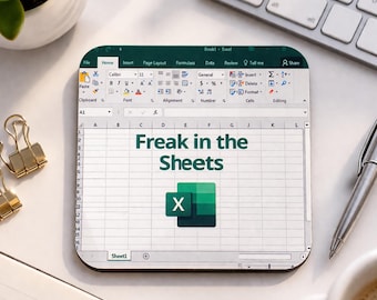 May include: Square coaster with an Excel spreadsheet design, the text reads "Freak in the Sheets" with the Microsoft Excel logo. The coaster is on a white surface, near a keyboard and a pen.