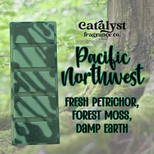 May include: A green wax melt bar with a marbled design, labeled "Pacific Northwest" by Catalyst Fragrance Co. The scent is described as fresh petrichor, forest moss, and damp earth.