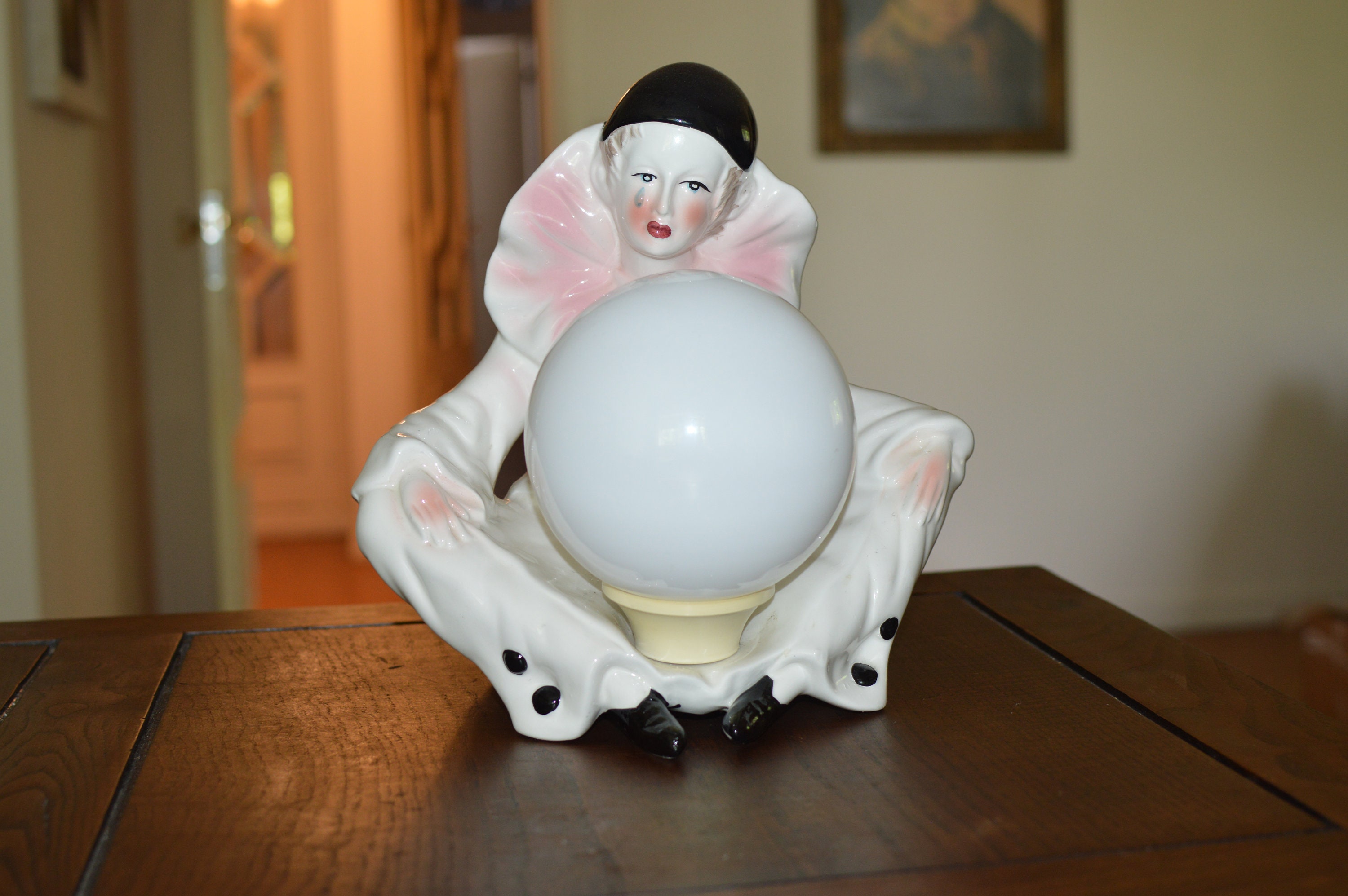 Small but knowing clown doll clearance