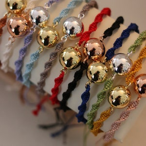 pregnancy bola bracelet