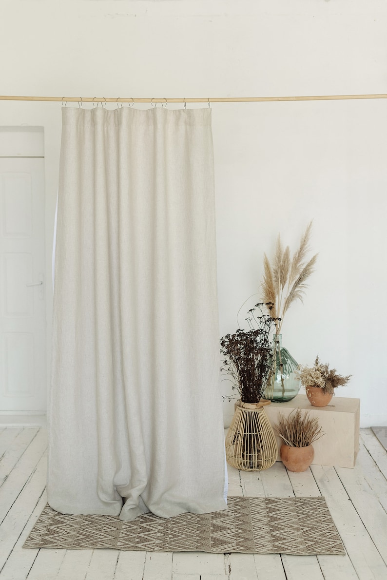 Sustainable linen shower curtains can be a thing of beauty and complement the aesthetics of your farmhouse bathroom interior.