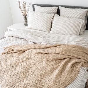 Striped Natural linen duvet cover and two pillowcases in various colors suitable for farmhouse living, best for minimalist or boho style.