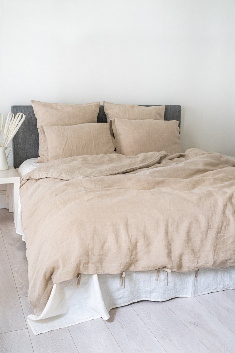 Natural light linen duvet cover and two pillowcases in various colors suitable for farmhouse living, best for minimalist or boho style.