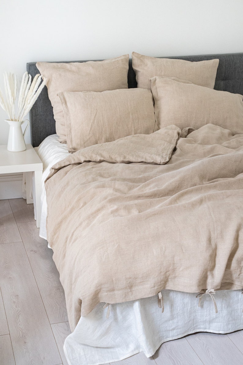 Natural light linen duvet cover and two pillowcases in various colors suitable for farmhouse living, best for minimalist or boho style.