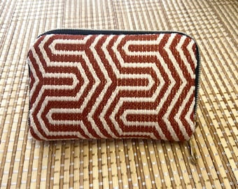 Cartera compacta tipo acordeón.