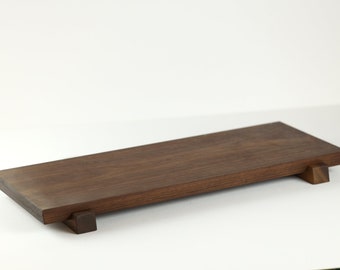 Elegant Black Walnut wood sushi tray, perfect for serving and adding a touch of decor to your table.