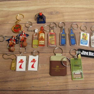 Vintage Keychains-Alcohol-Beer-Sports-Band-Budweiser-Seagrams-Bacardi-Captain Morgan-Nike-Pepsi-Coke-Nesquick-Sketchers-Phone Charms-ITA Bag