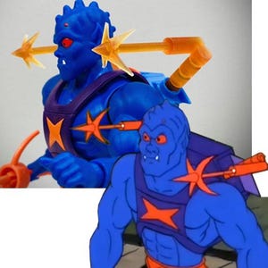 As seen in the Cartoon: WEBSTOR CARTOON Shoulder Hook Launcher MOTU