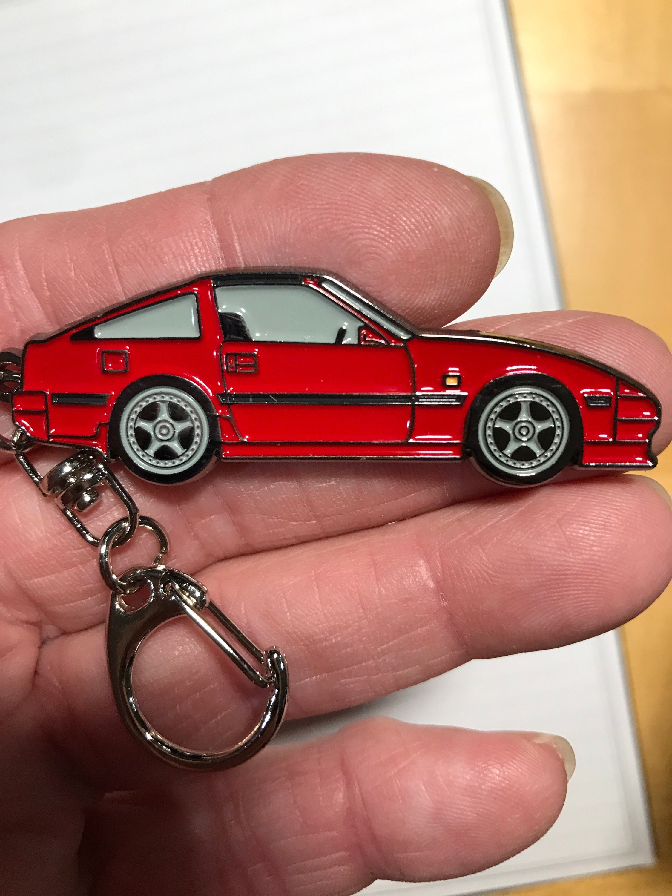Nissan 10th Anniversary キーホルダー 日産オンラインショップ：NISSAN メタルキーリング シルバー