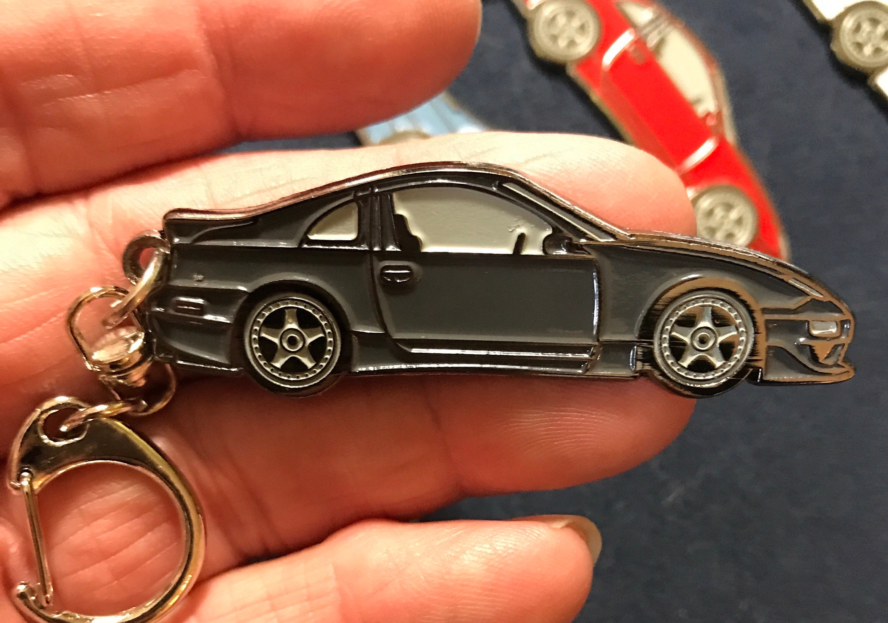 Nissan 10th Anniversary キーホルダー 日産オンラインショップ：NISSAN メタルキーリング シルバー