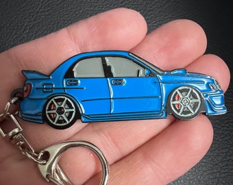 Llavero para WRX, Sti AZUL con versión modificada y esmaltada. Llaveros de metal esmaltado.