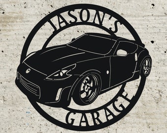 May include: Black metal sign with the text "Jason's Garage" in a circle around a silhouette of a black sports car.