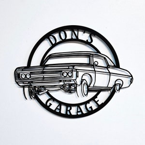 May include: Black and white silhouette of a classic car with the text "Don's Garage" in a circle around it.