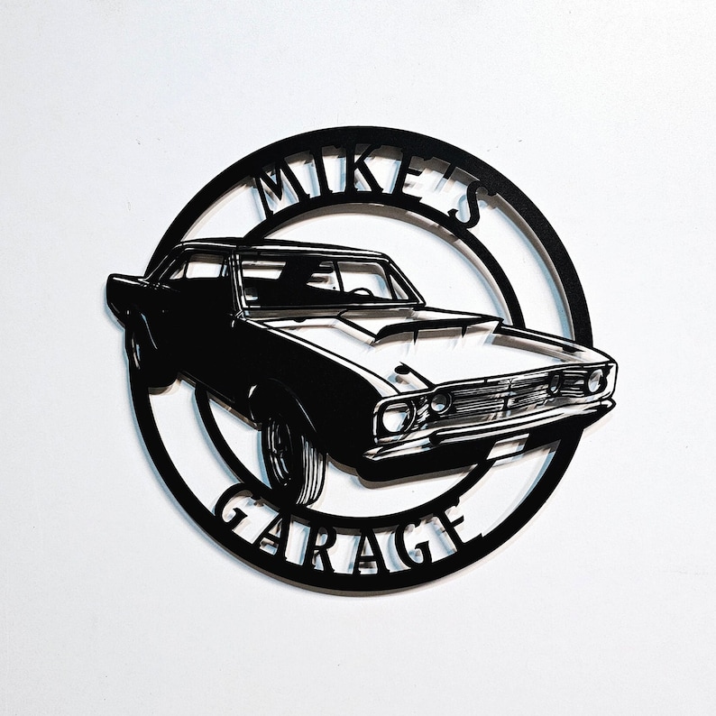 May include: Black metal sign with a silhouette of a classic car and the text "Mike's Garage".