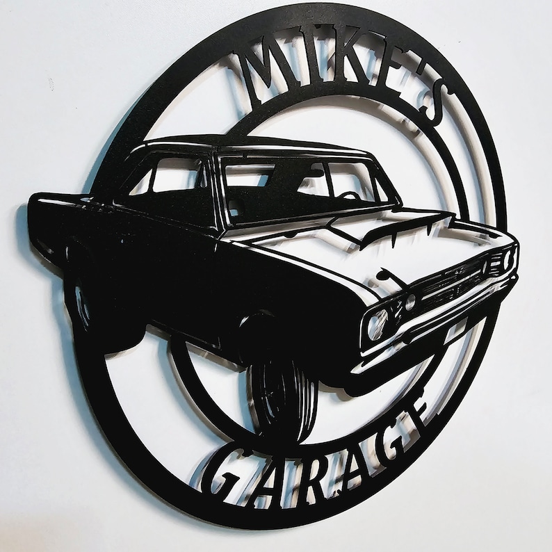May include: Black metal silhouette of a classic car with the words "Mike's Garage" in a circle around it.