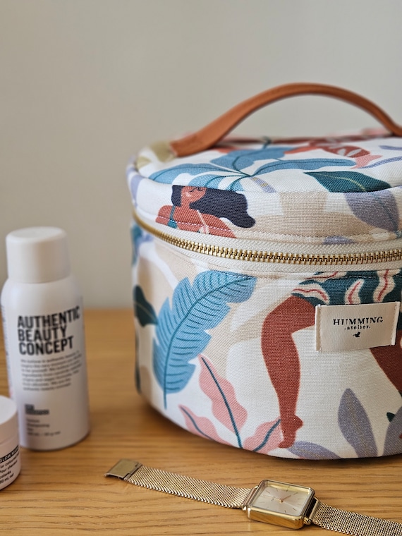 Round toiletry bag hotsell