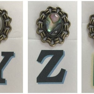 22 x 26 mm Oval Brass Base with Stone or Shell Cabochon.