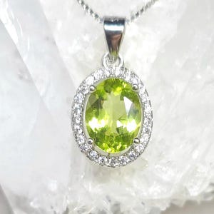 Natural green peridot necklace with solitaire diamond halo in sterling silver