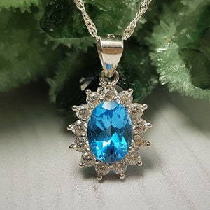 Swiss blue topaz teardrop diamond halo silver necklace