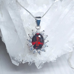 Red garnet silver necklace with oval halo pendant