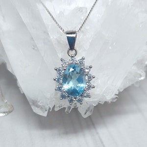 Genuine sky blue topaz diamond halo sterling silver necklace