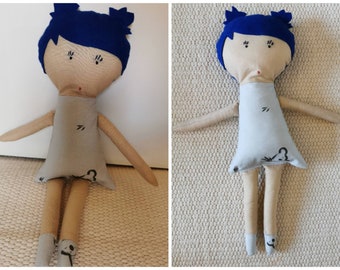 Mixed-race doll in felt and cotton