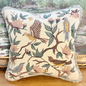 Needlepoint pillow finishing service.  Experienced hand sewing. Includes backing, twisted cording, and insert. Custom work welcomed.