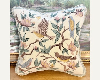 Needlepoint pillow finishing service.  Experienced hand sewing. Includes backing, twisted cording, and insert. Custom work welcomed.