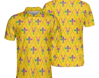 May include: Yellow polo shirt with a repeating pattern of purple and green fleur-de-lis and crawfish within a diamond grid. The shirt has a collared neckline and short sleeves. A second shirt is visible in the background.