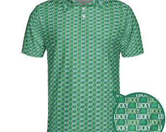 May include: Green polo shirt with a repeating pattern of the word "LUCKY" and shamrocks. The shirt has a collared neckline and short sleeves. The pattern is a grid of white text on a green background. A close-up shows the pattern in detail.