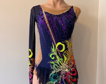 May include: A black leotard with a rainbow floral design and rhinestones. The leotard has one long sleeve and one short sleeve.