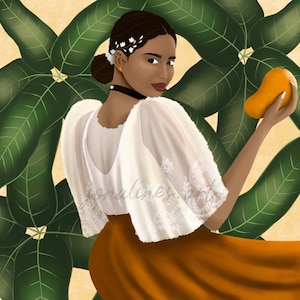 May include: A woman in a white dress with lace detailing holds a yellow mango in front of a green leafy background.