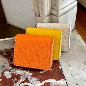 Portefeuille zippée en cuir grainé